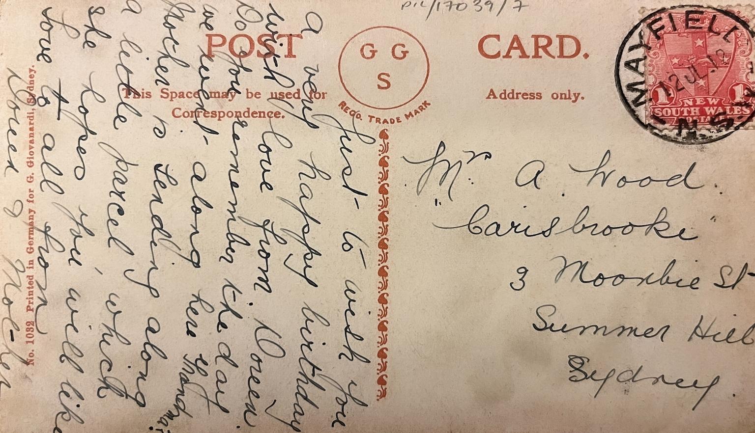 Back of an old postcard with a handwritten birthday message for 'Grandma'