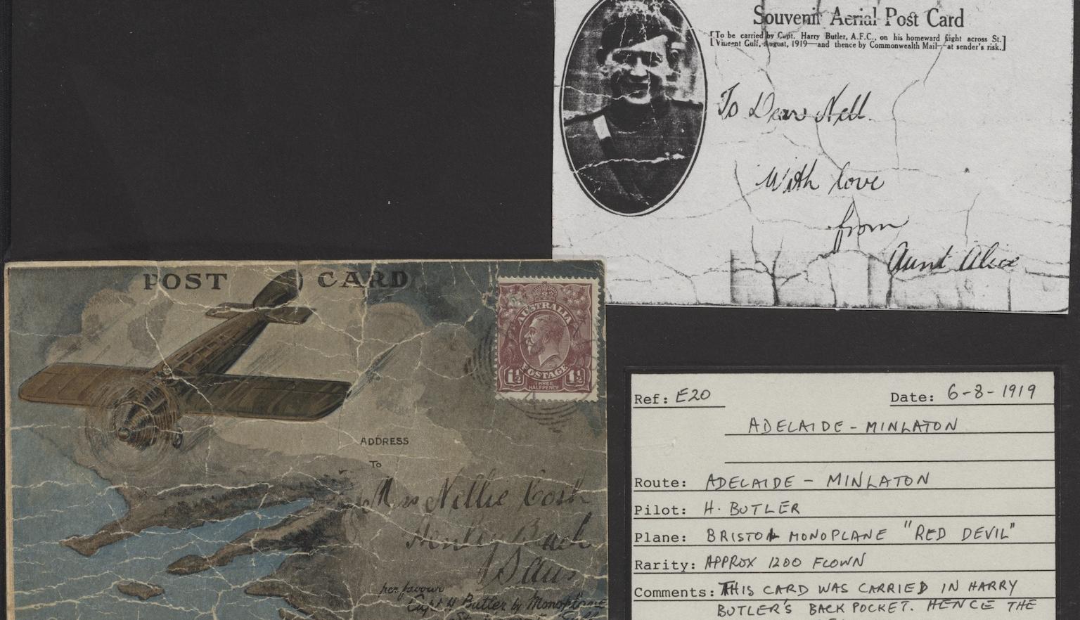 Either side of a small postcard, the front featuring a photo of a plane and the back with a message reading 'With love from Aunt Alice' and a card with a description of the card's signficance