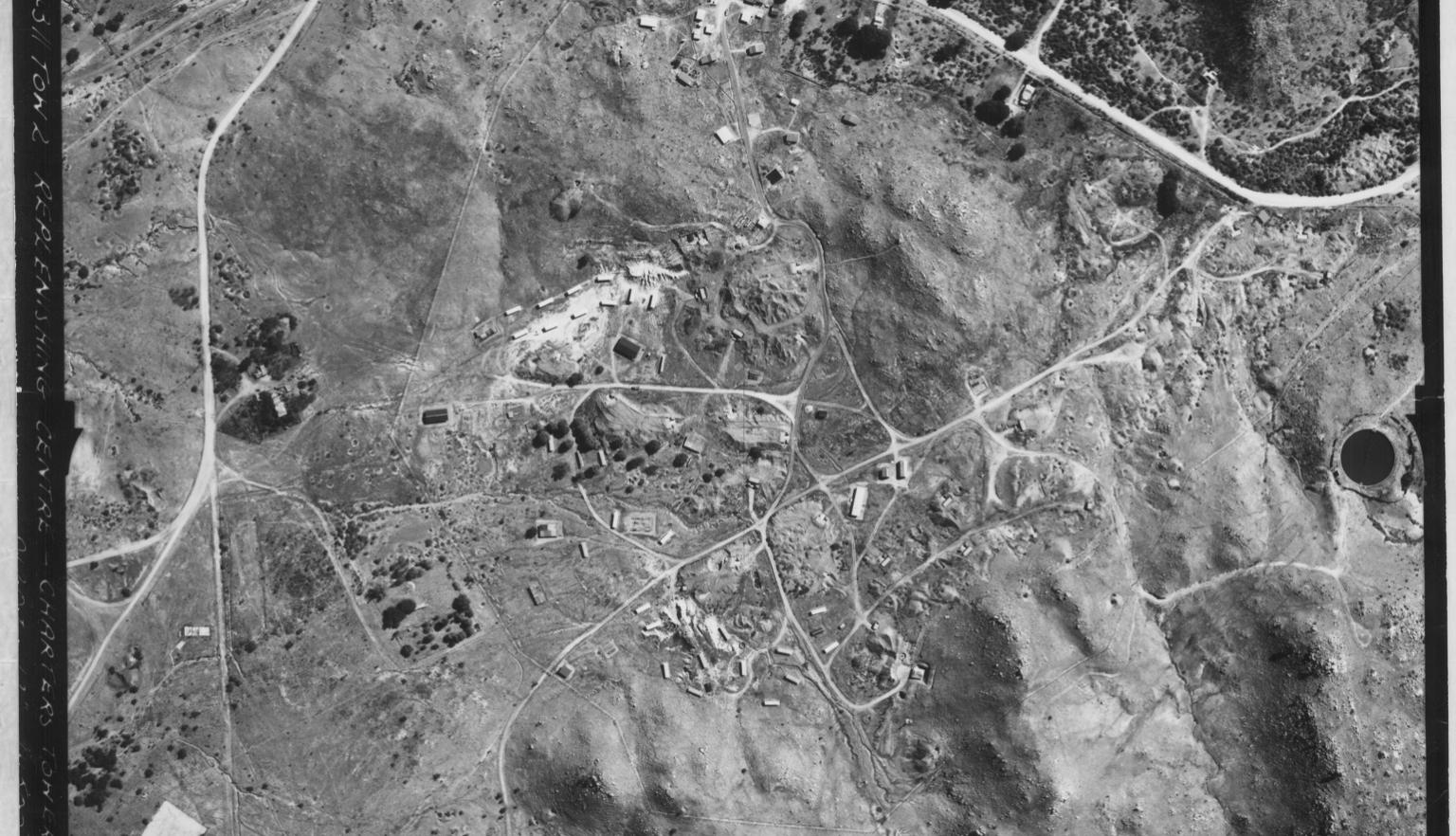 A black and white aerial image of Charters Towers. 