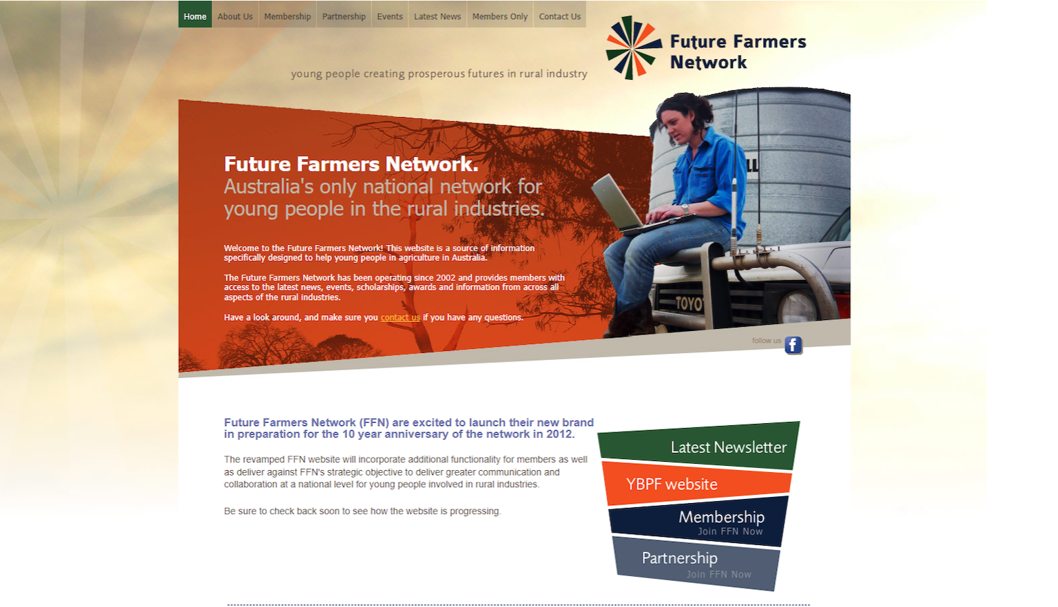 Website homepage with an image of a woman using a laptop while sitting on a car in front of a water tank, with key text reading 'Future Farmers Network. Australia's only national network for young people in the rural industries' and a yellow, orange, green and white colour scheme