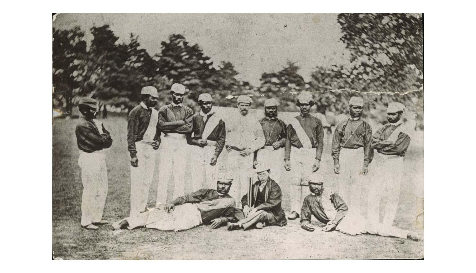 Black and white photo of Aboriginal Australian cricketers in 1868 with C. Lawrence and W. Shepherd as Manager and Captain