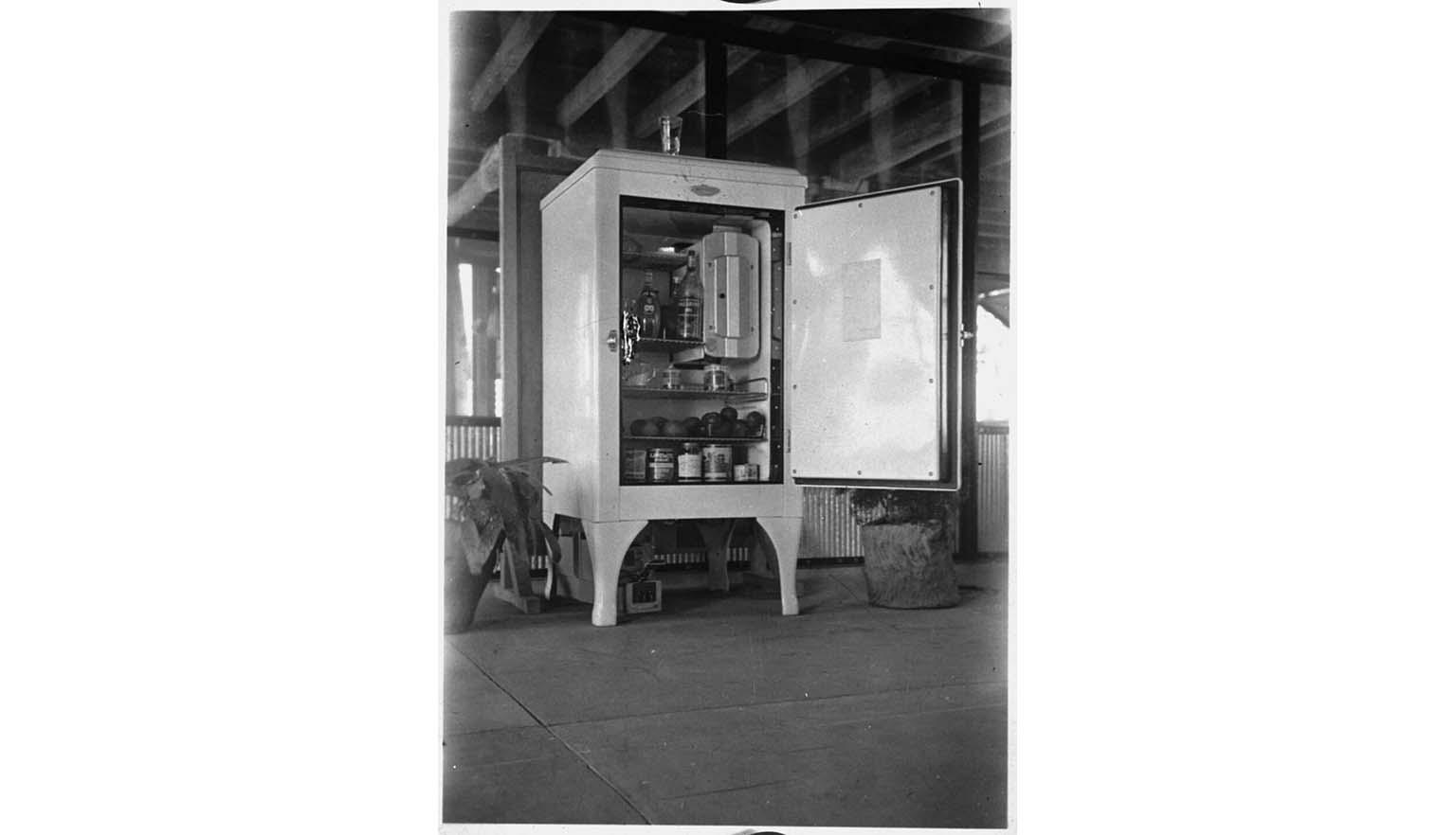 black and white photo of a first aid fridge