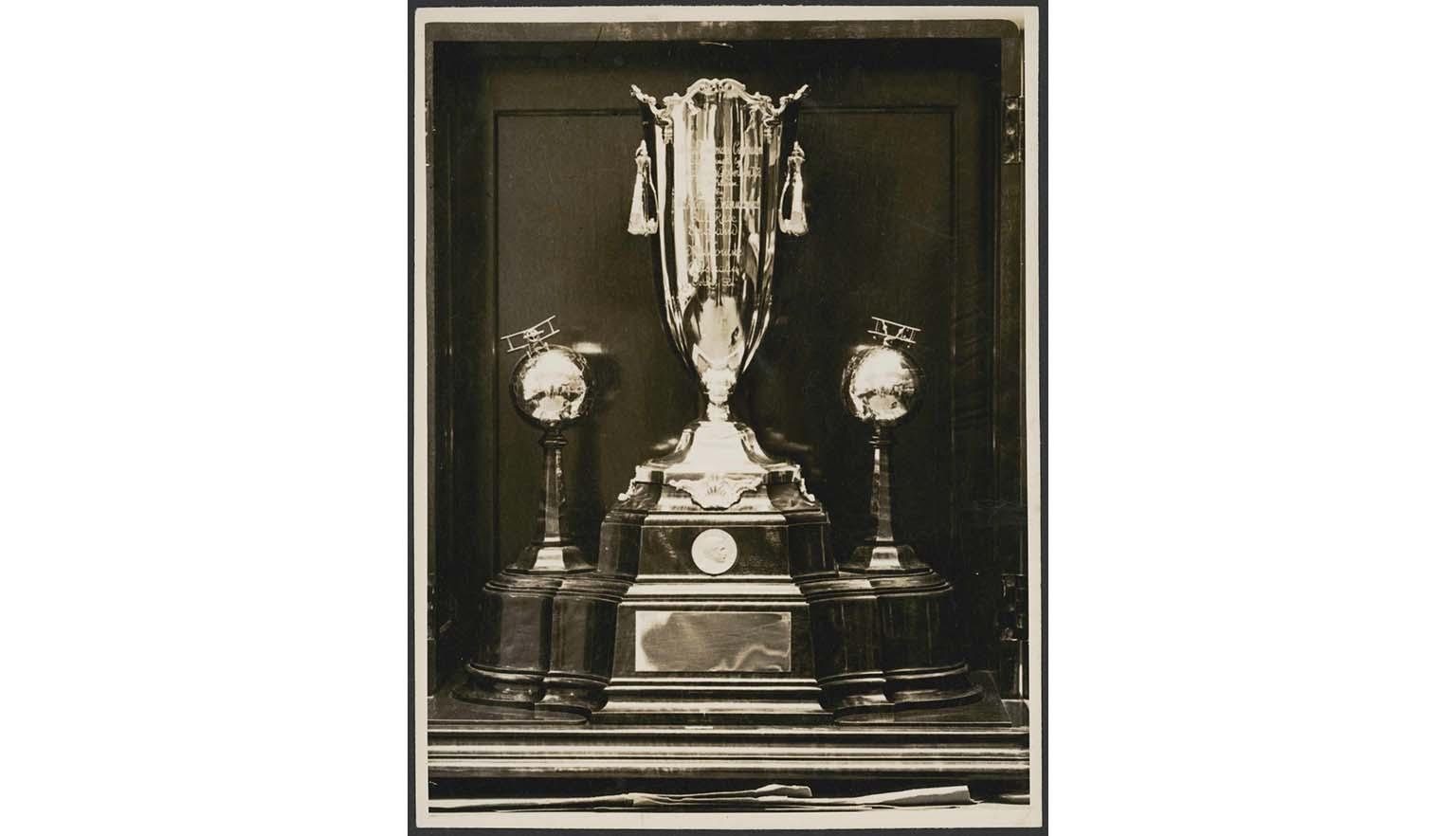 black and white photograph of a silver trophy