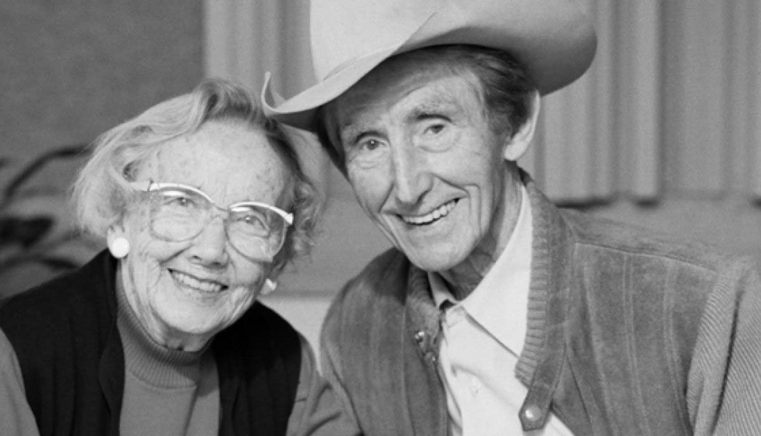 Black and white photo of Smoky and Dot Dawson smiling at the camera