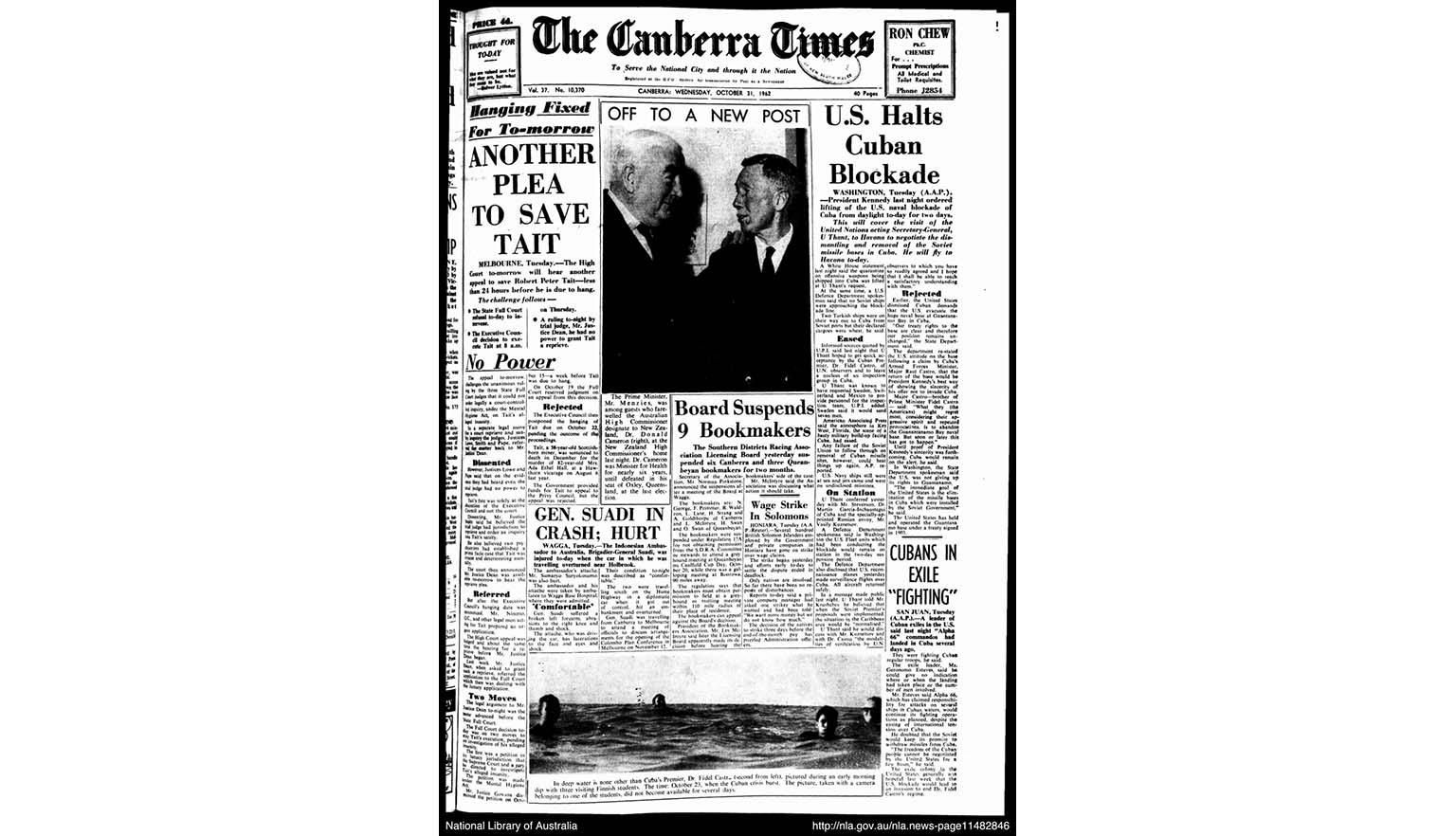 The front page of The Canberra Times newspaper. Several headlines scatter the page. One reads 'U.S. Halts Cuban Blockade'. There is a black and white photograph of Prime Minister Menzies shaking hands with Donald Cameron, High Commissioner to New Zealand