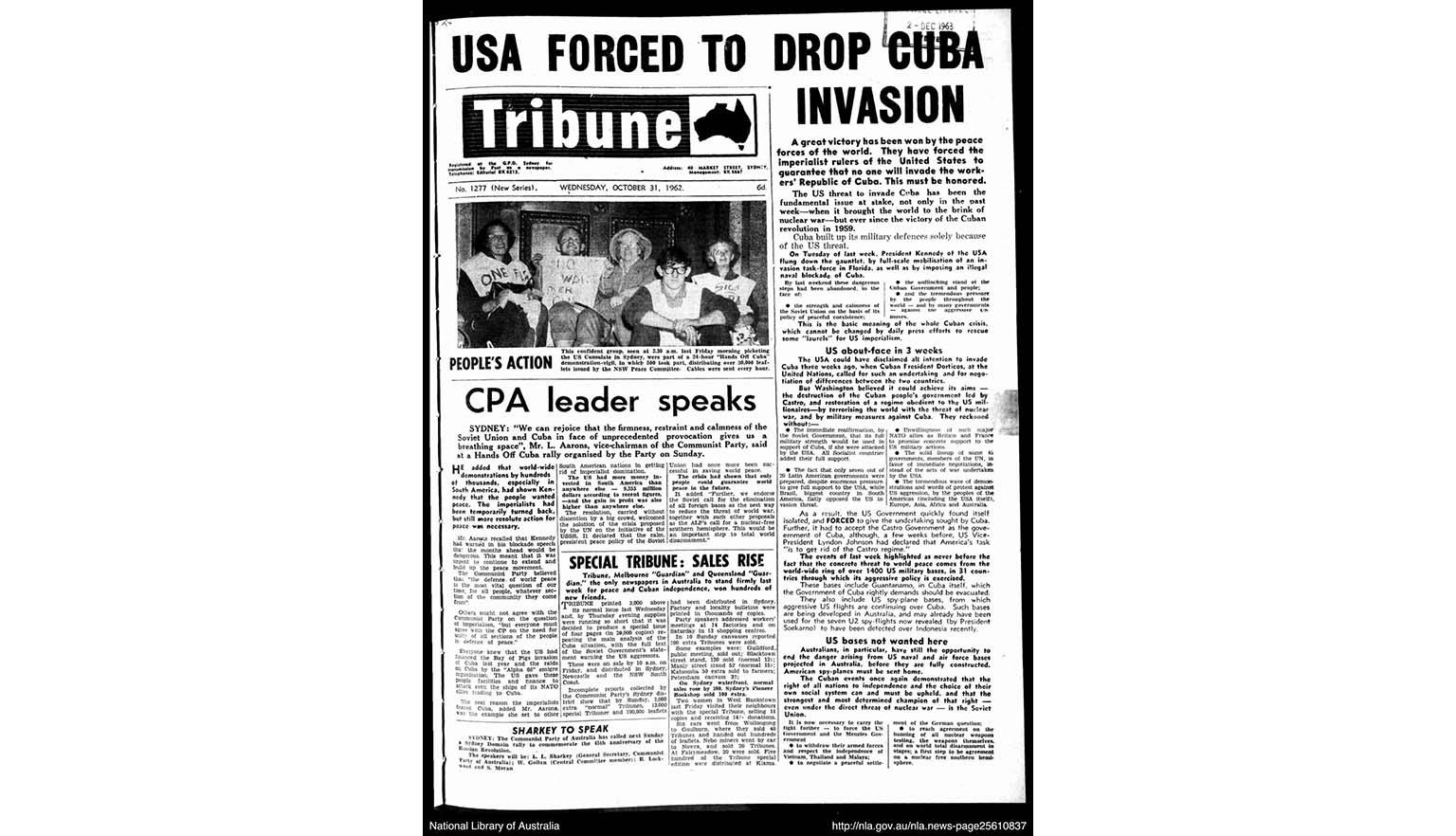 The front page of the Tribune newspaper. The headline reads 'USA FORCED TO DROP CUBA INVASION'. There is a black and white photograph of 5 people holding protest signs.