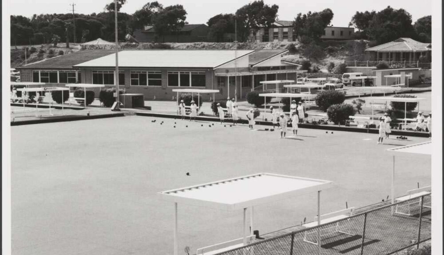 Black and white photo of people bowling on the lawn at Geraldton Bowling Club