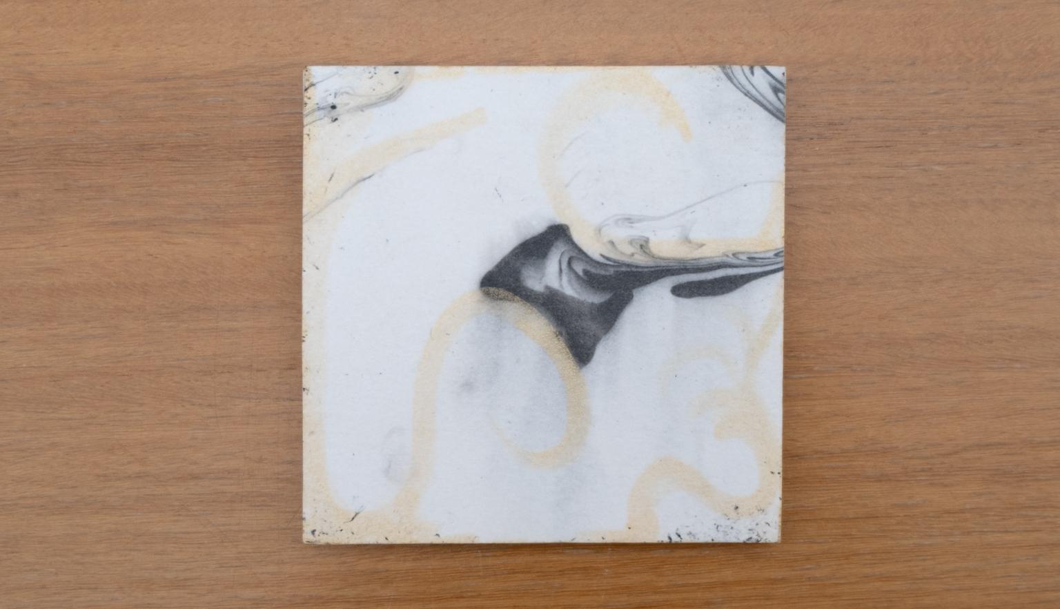 Travel diary back cover with a black and white abstract design