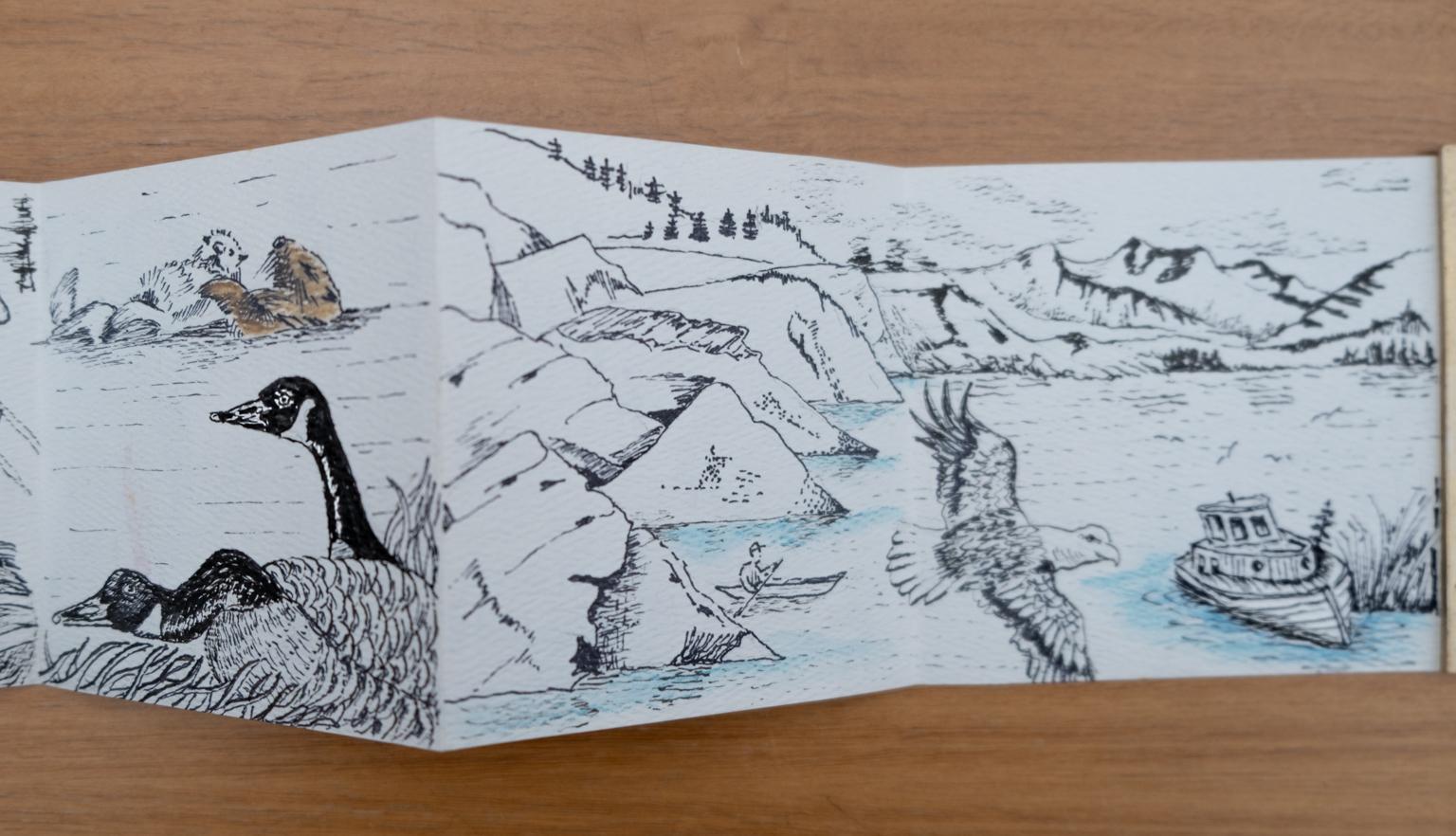 Fold-out travel diary open to four pages with black and white illustrations of otters, birds and mountains in Alaska