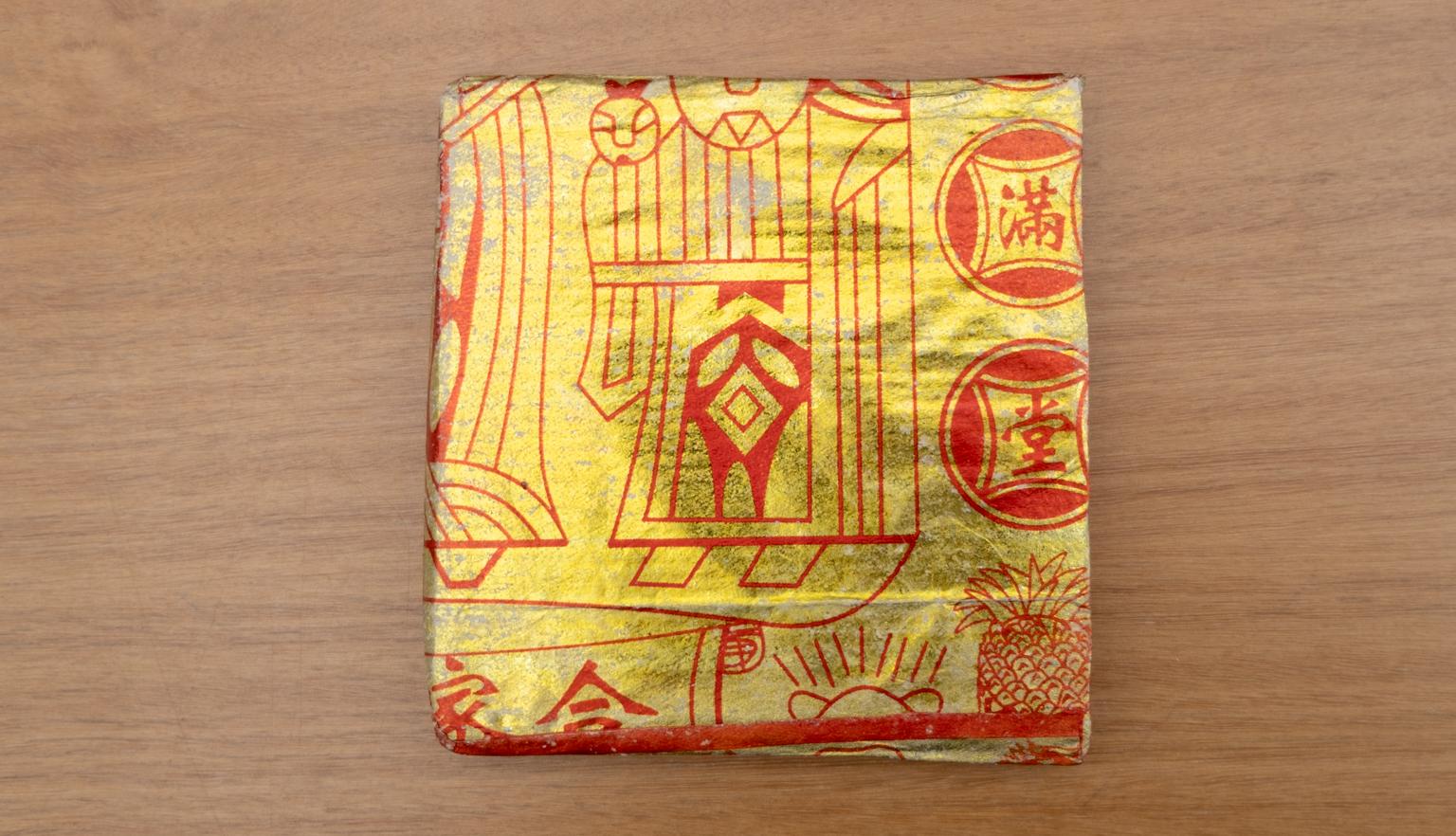 Shiny gold and red slipcase