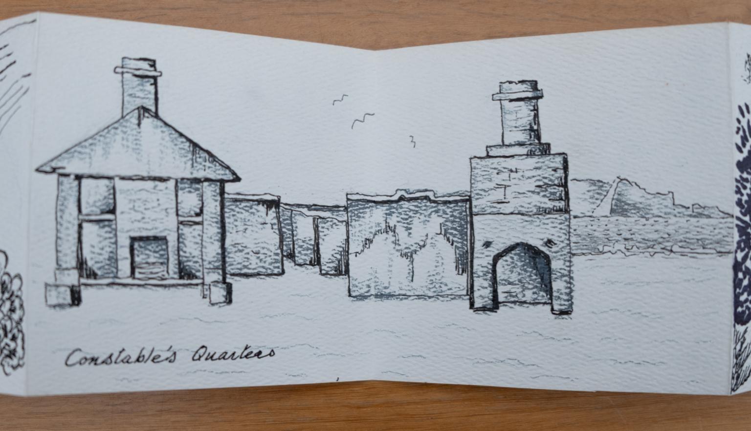 Fold-out travel diary open to four pages with black and white illustrations of a building labelled 'Constable's Quarters'