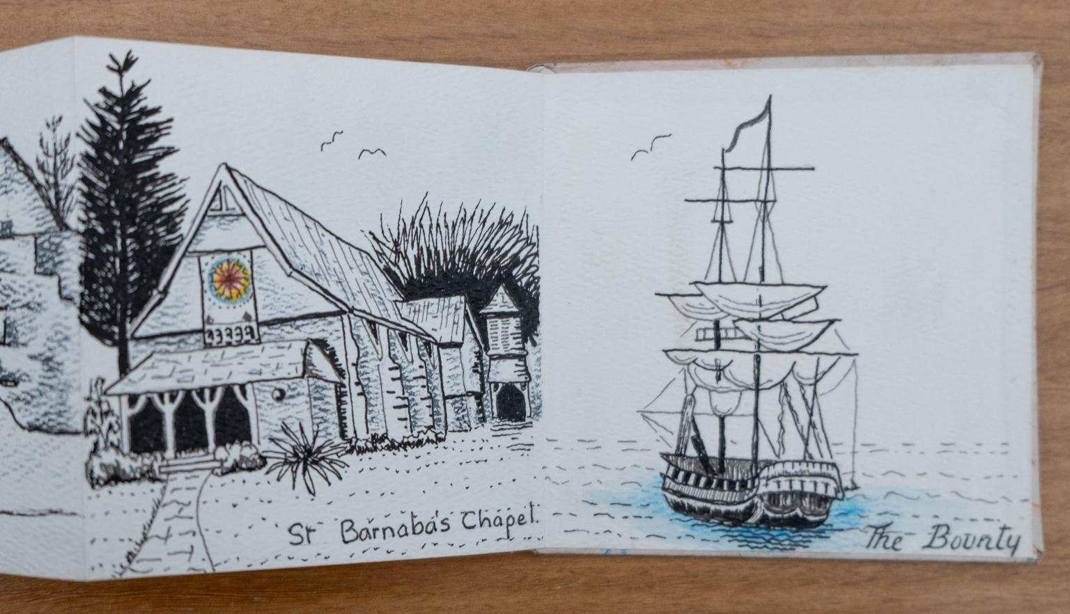 Fold-out travel diary open to four pages with black and white illustrations of a chapel labelled 'St Barnabas' Chapel' and a large ship labelled 'The Bounty'