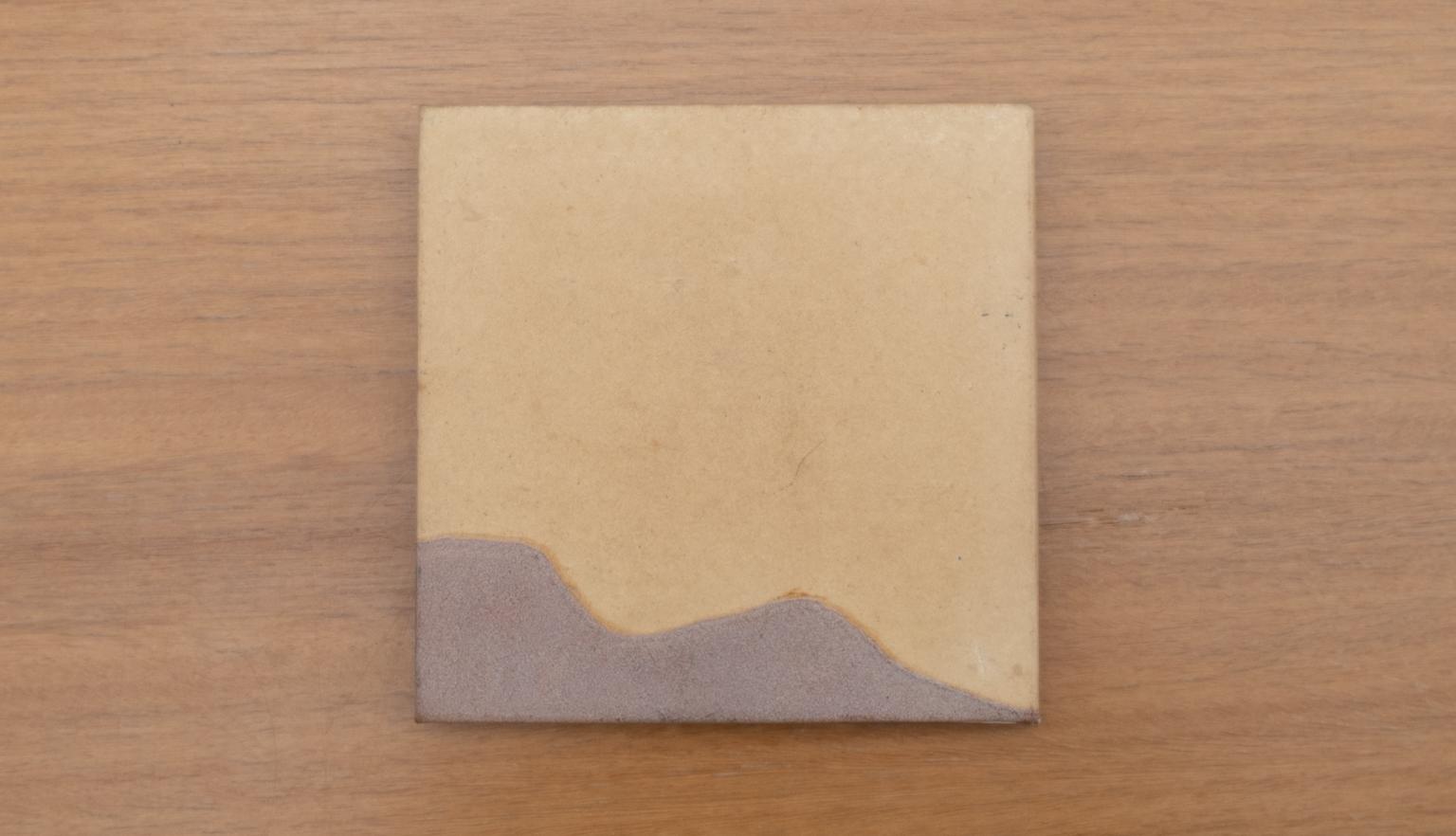 Travel diary back cover with a simple brown mountain design
