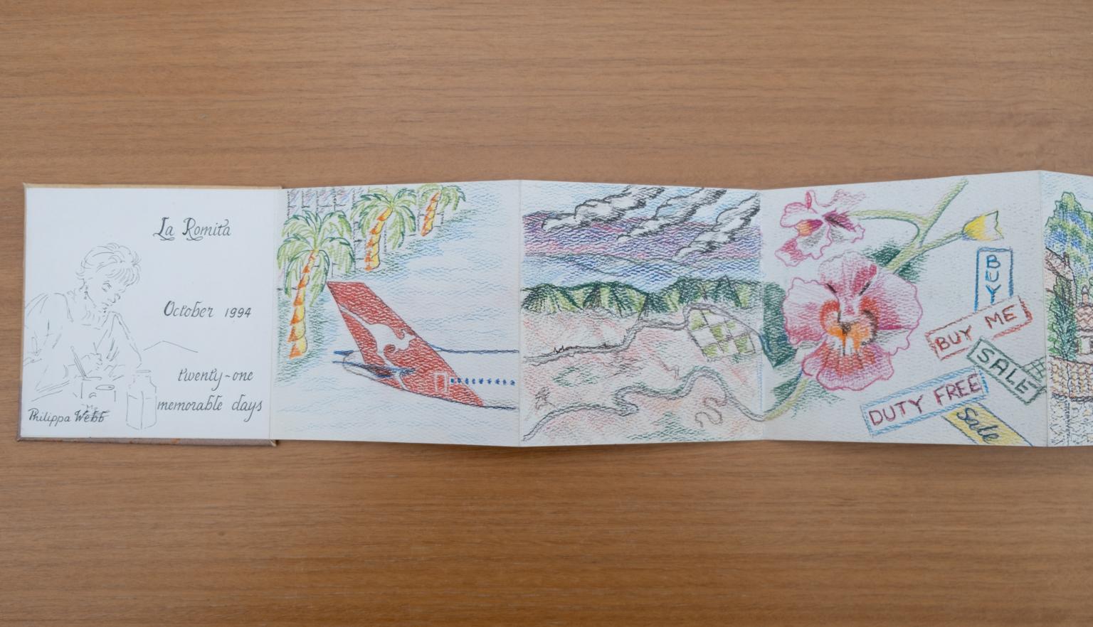 Fold-out travel diary open to four pages with colourful illustrations of a plane, a road through the mountains and pink flowers. The first page has text reading 'La Romita October 1994 twenty-one memorable days'
