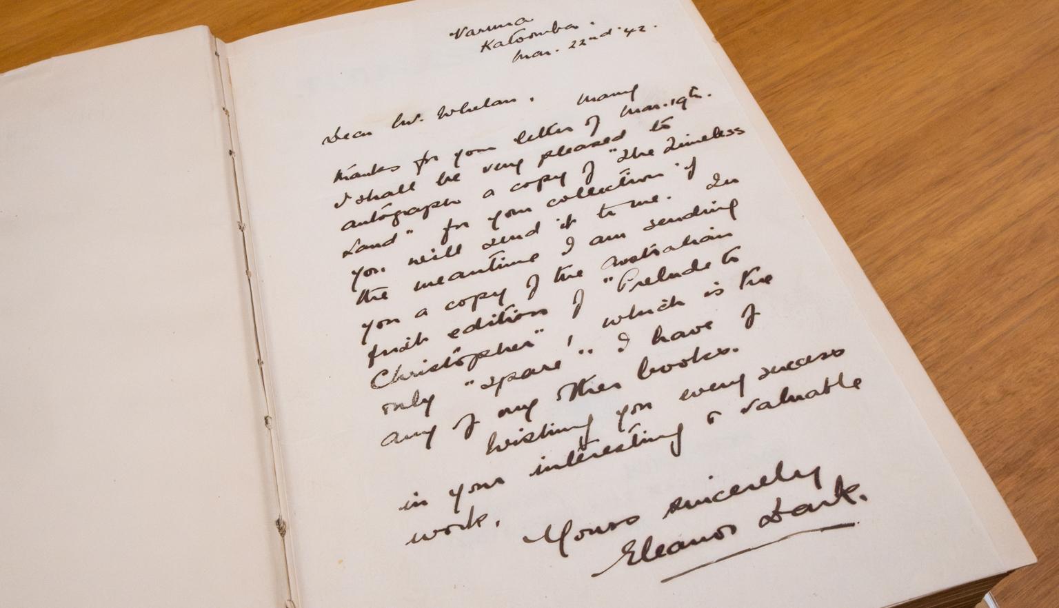 Handwritten letter from Eleanor Dark to Philip Whelan about signing copies of her books to give to him, kept in a copy of one of her books.