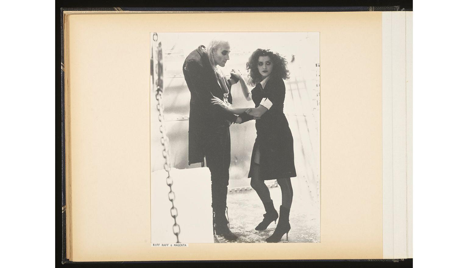 Richard O’Brien (Riff Raff) and Patricia Quinn (Magenta) in costume and dancing together on the set of The Rocky Horror Picture Show 
