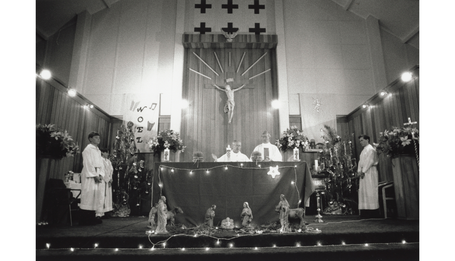 Black and white photo of a Christmas Midnight Mass service