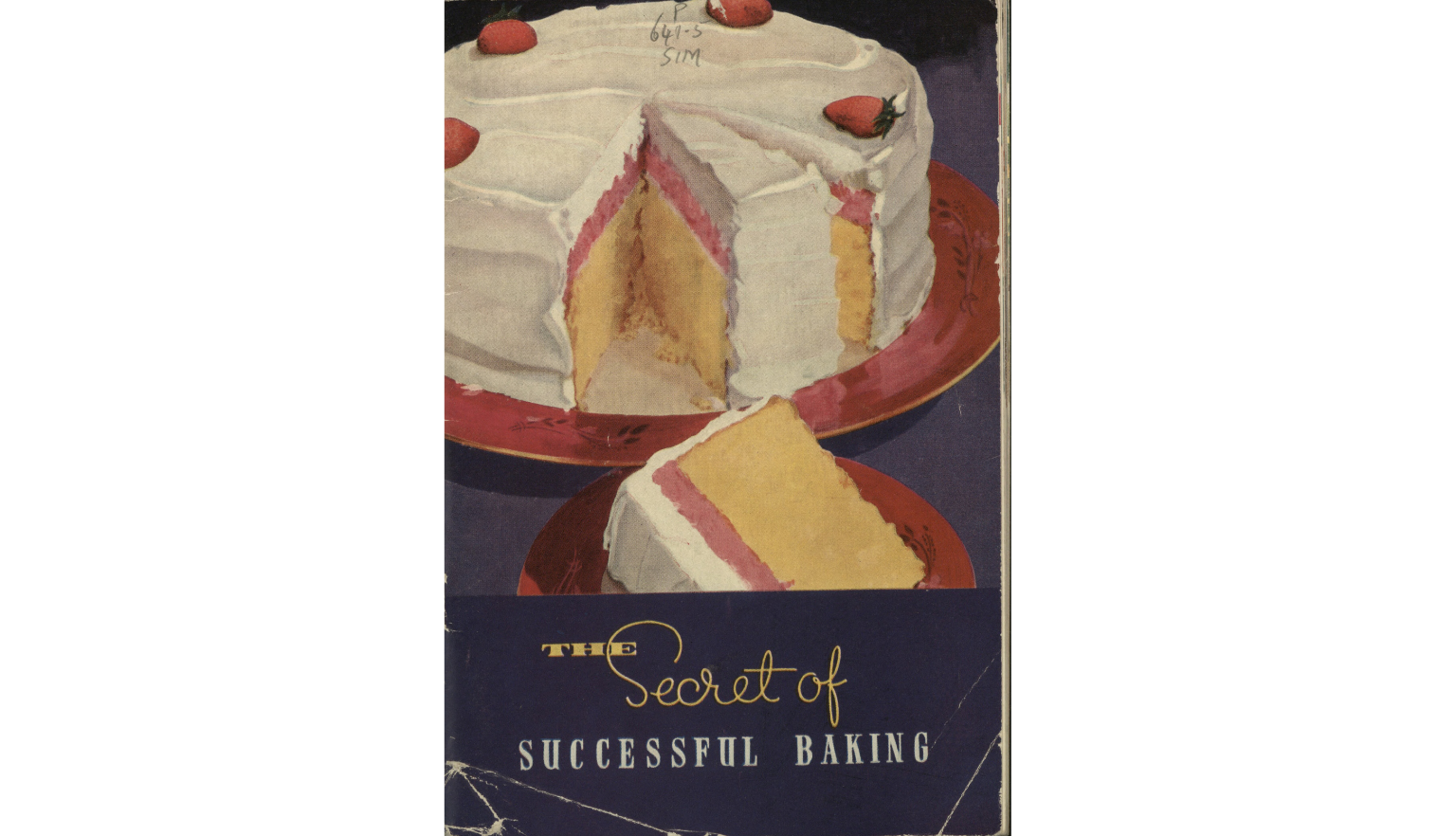 Cover of ‘The Guide to Successful Baking’, featuring a cut up sponge cake decorated with white icing and strawberries.