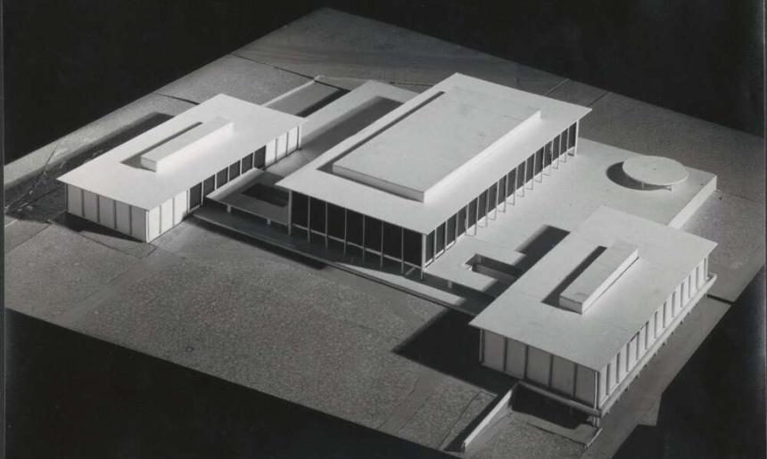 Simple model of three rectangular, connected buildings with columns and flat rooves.