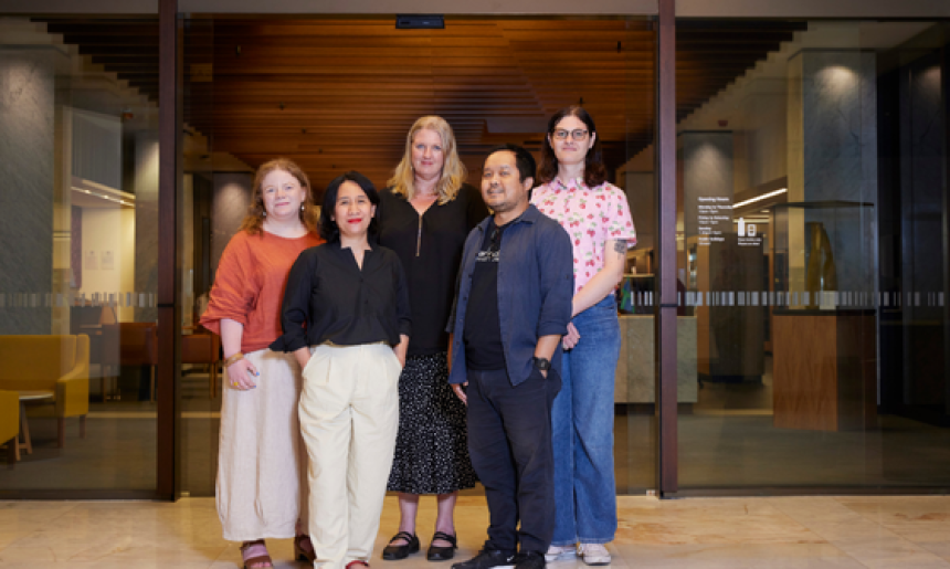 Five people standing in front of the Main Reading Room