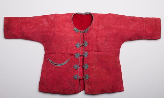 Small red christening gown with black buttons down the centre