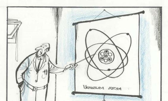 cartoon of a man gesturing to a diagram of the uranium atom