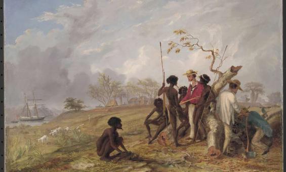 A group of men are gathered around a fallen tree in an outdoor setting. One person is seated on the ground, while others stand and hold spears. Two individuals engage in manual labor. A ship is anchored near the shore in the background, with sheep grazing on the grassy landscape. The sky is partly cloudy, and there are trees and a small structure in the distance. This scene depicts a moment of cultural interaction and shared labor during a historical period of exploration and colonisation.