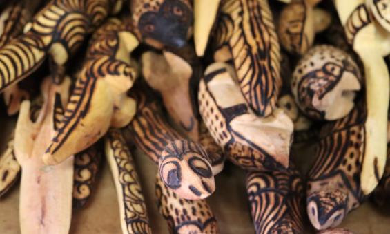 Close up photo of carved wooden objects