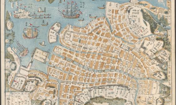 Hand-drawn historical map of a coastal city with detailed streets, waterways, and buildings. Various ships are shown in the harbor, including sailing ships with multiple masts. The map contains handwritten labels in an East Asian script, with buildings and city layout depicted in a bird's-eye view.