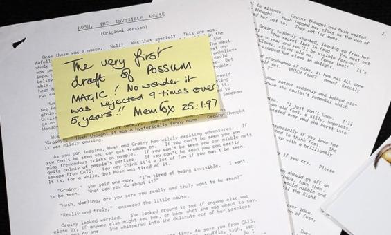 A photograph showing a typed manuscript with a sticky note on top that reads, “The very first draft of Possum Magic! No wonder it was rejected 9 times over 5 years!” The manuscript is part of Mem Fox’s collection.