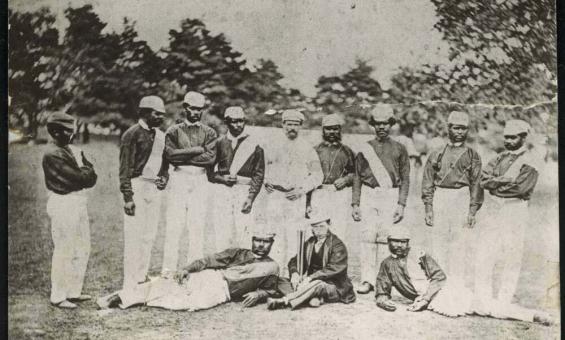 Black and white photo of Aboriginal Australian cricketers in 1868 with C. Lawrence and W. Shepherd as Manager and Captain