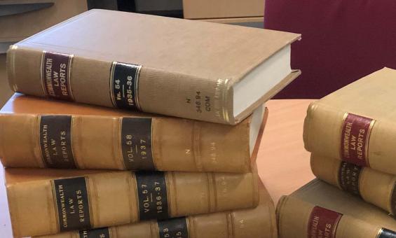 Law books stacked on a desk