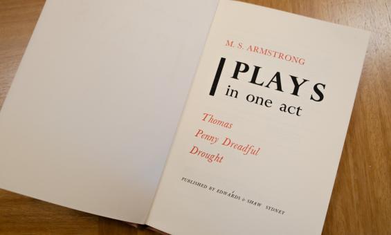Book open to title page with text reading 'M. S. Armstrong', 'Plays in on act', 'Thomas', 'Penny Dreadful', 'Drought' and 'Published by Edwards & Shaw Sydney'