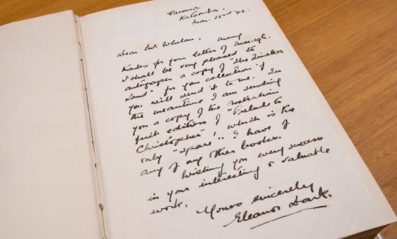 Handwritten letter from Eleanor Dark to Philip Whelan about signing copies of her books to give to him, kept in a copy of one of her books.
