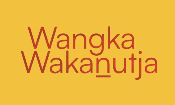 Red text reading 'Wangka Wakanutja' on a yellow background