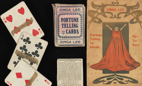 Old playing cards are laid out next to the box depicting a fortune-telling woman, arms stretched out and wearing a red dress